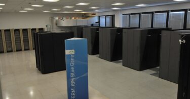 Rows of supercomputer cabinets in a data centre hall